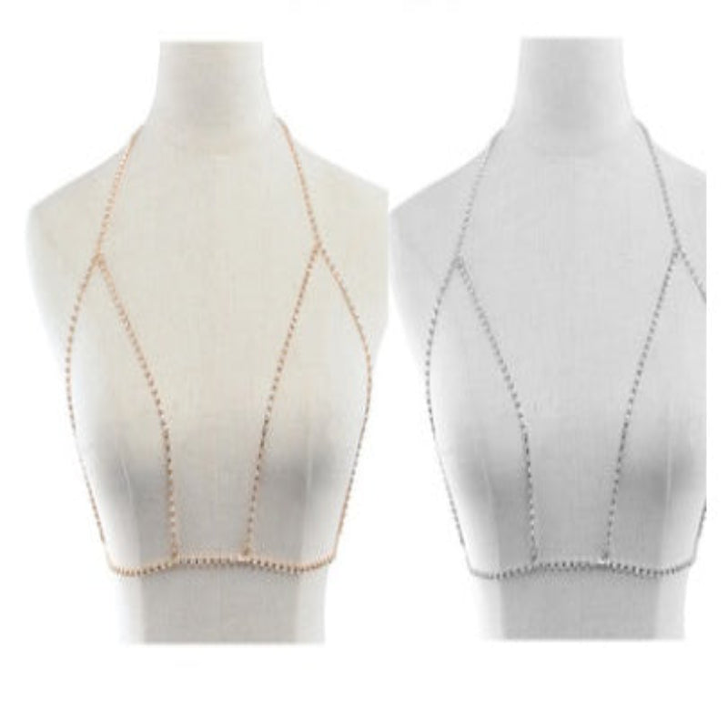 Two white crop tops with beige stitching on mannequins against a white background.