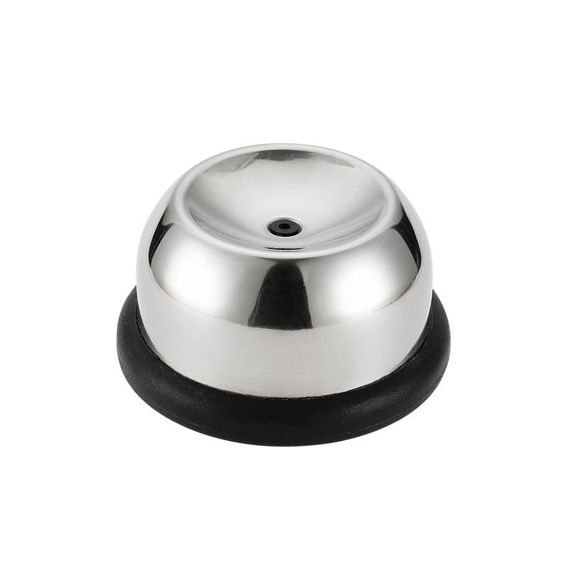 Metallic bell with black base on a white background