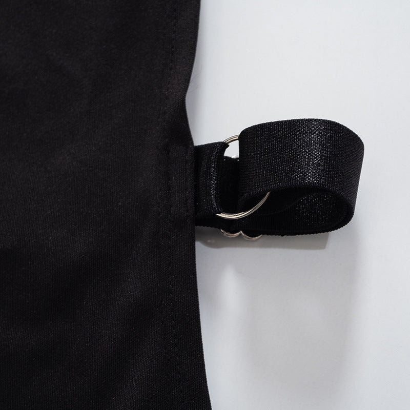 Black belt with a gold buckle on a mannequin against a white background