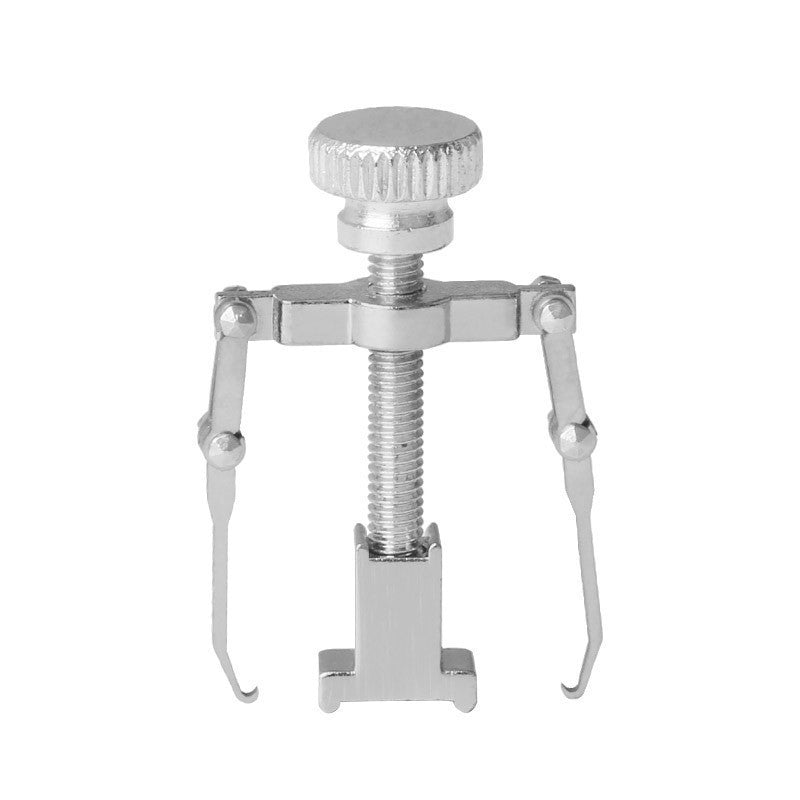 Metallic tool with a adjustable screw on a white background