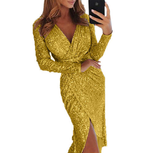 Woman wearing a sparkly gold dress on a white background