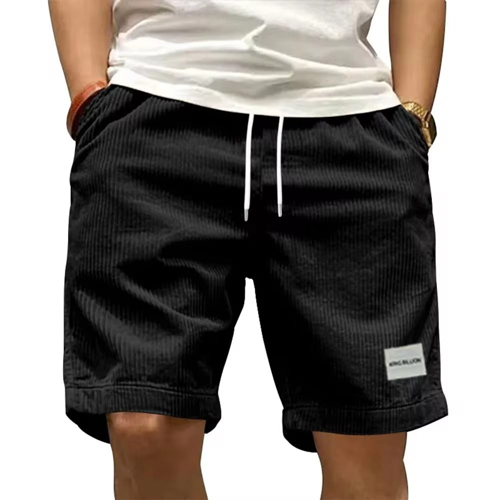 A collection of men's casual shorts in various colors including beige, black, blue, green, khaki, and more, featuring a mid-waist rise and a straight leg cut.