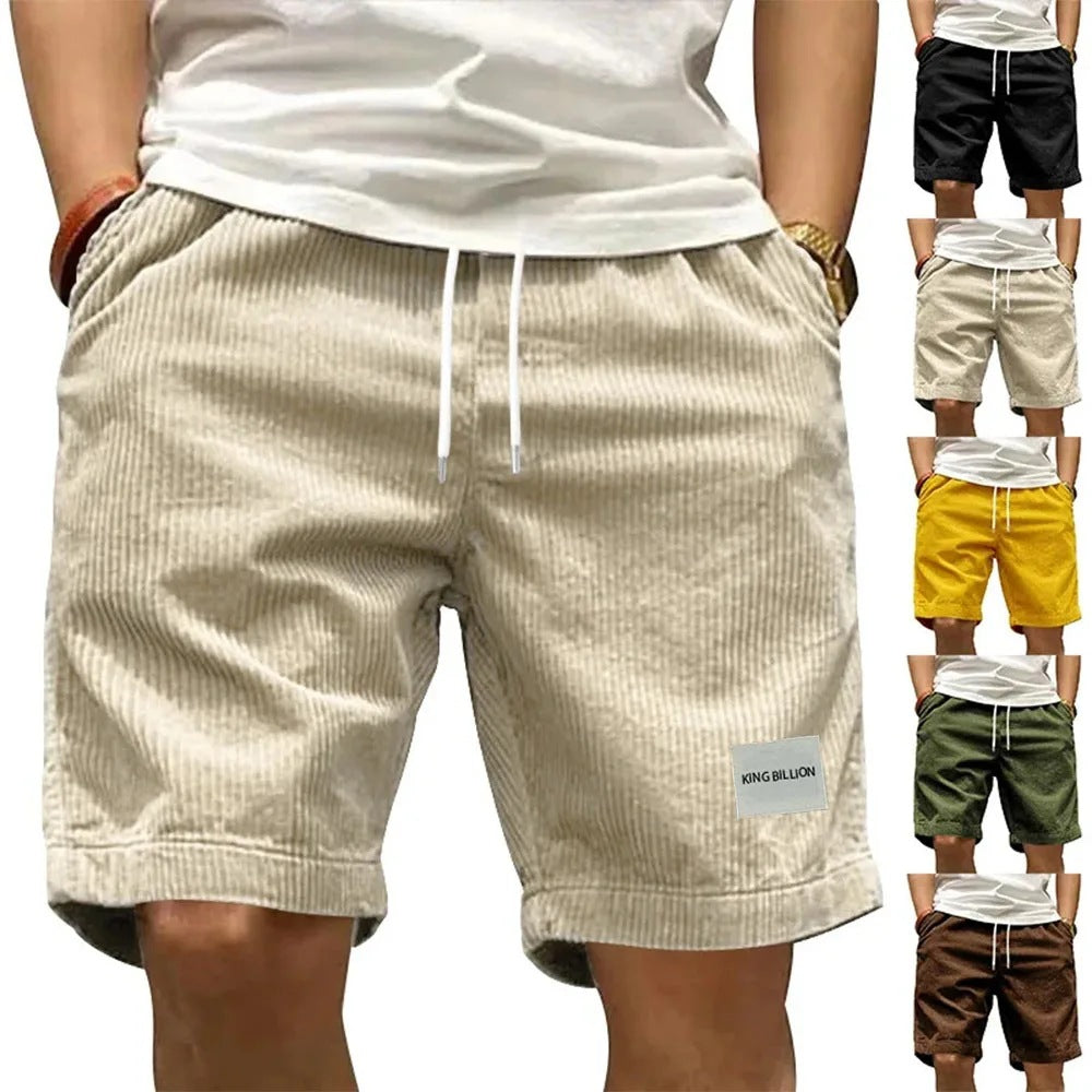 A collection of men's casual shorts in various colors including beige, black, blue, green, khaki, and more, featuring a mid-waist rise and a straight leg cut.