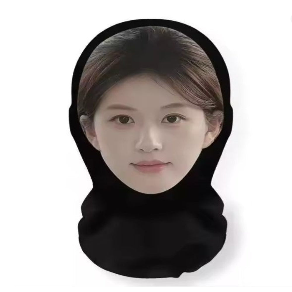 A novelty face mask or hooded face cutout featuring a printed portrait of a young woman with brown hair, shown against a plain white background.