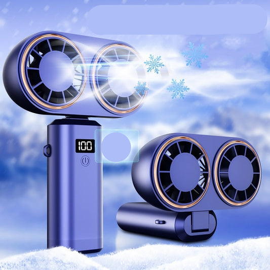 Portable handheld fan with digital display on a snowy background