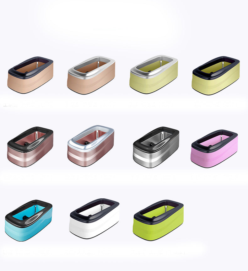 Collection of small rectangular containers in various colors on a white background