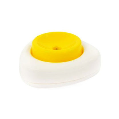 Yellow circular object on a white base with a white background