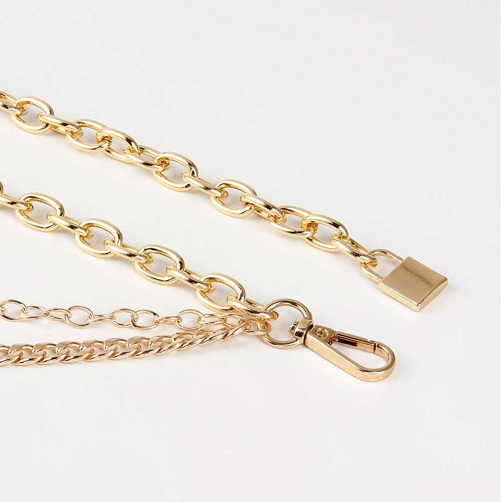 Gold chain with clasp on white background