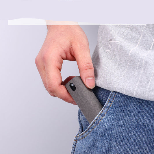 Hand holding a small gray device, with text 'Small and easy to carry' on a light gray background.