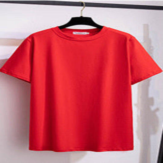 Red t-shirt on a hanger against a white background