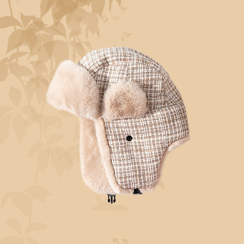 Ear protecting Lei Feng hat with fur ear covers on a beige background