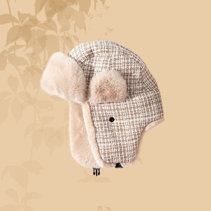 Ear protecting Lei Feng hat with fur ear covers on a beige background