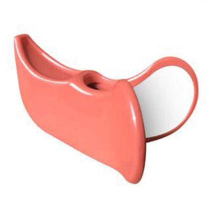 Coral-colored dental floss holder on a white background