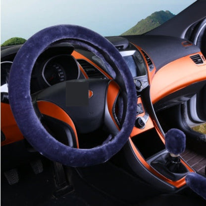 Steering wheel cover on a car steering wheel with orange interior