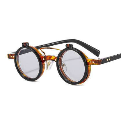 Round eyeglasses with tortoiseshell frame on a white background