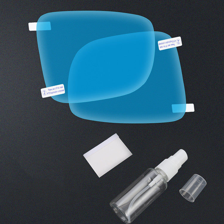 Blue car visor with cleaning cloth and spray bottle on a black background