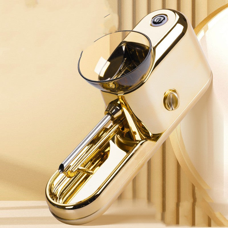 Gold kitchen mixer on a beige background