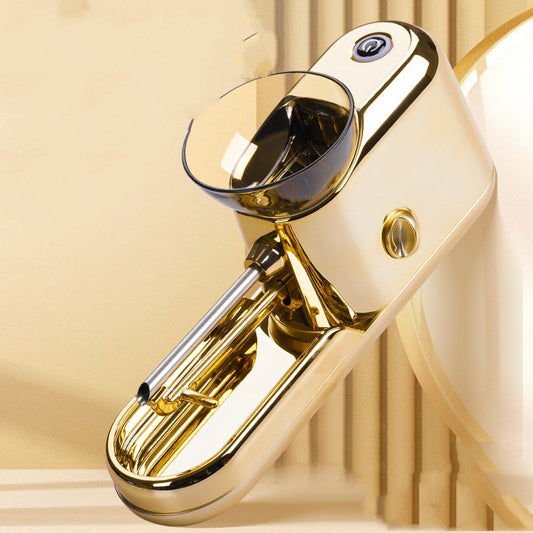 Gold kitchen mixer on a beige background