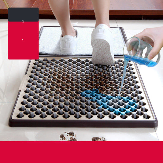 Person using a cleaning mat with a blue cleaning solution being poured over it.