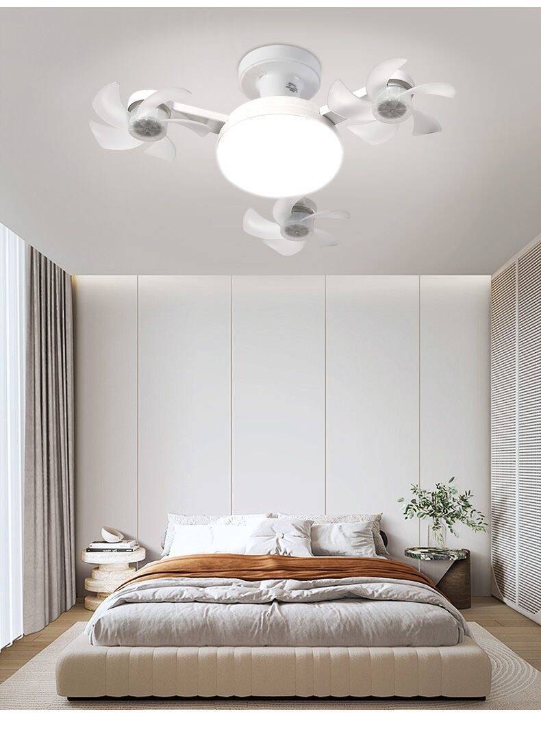 Modern bedroom with a ceiling fan and neutral decor