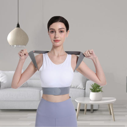 Woman wearing a back brace in a living room setting