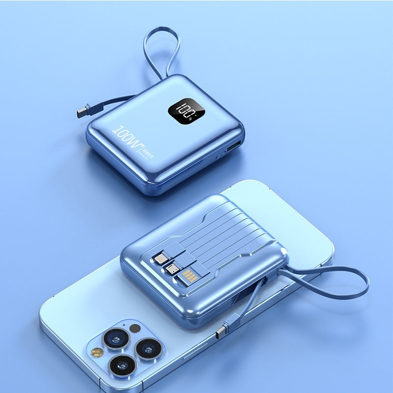 Blue portable power bank with digital display on a light blue background