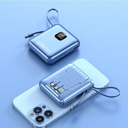 Blue portable power bank with digital display on a light blue background