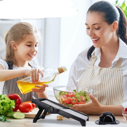 Woman and child preparing a salad with kitchen tools, promoting time-saving in the kitchen.
