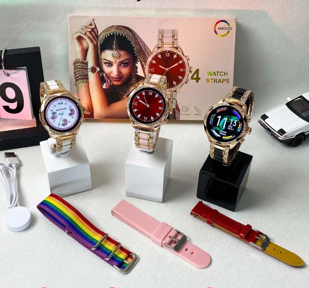 Smartwatch set with multiple straps on a display stand, including a rainbow strap, pink strap, and others, with a box in the background.