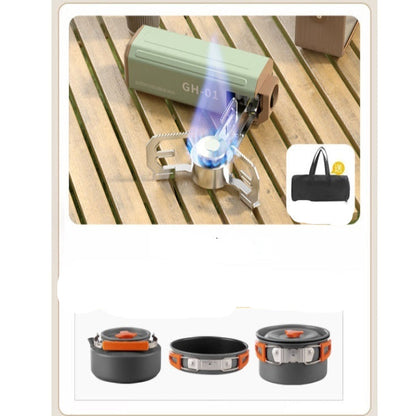 Portable cassette stove with accessories on a wooden surface