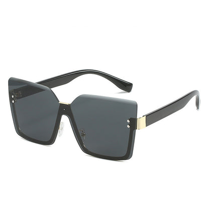 Sunglasses with black frame and dark lenses on a white background