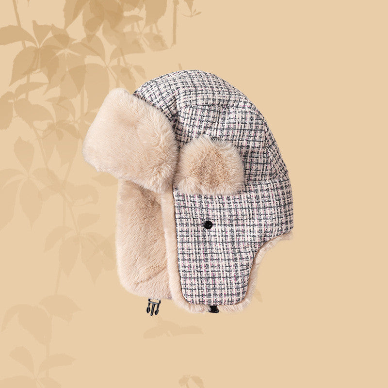 Ear protecting Lei Feng hat with fur trim on a beige background