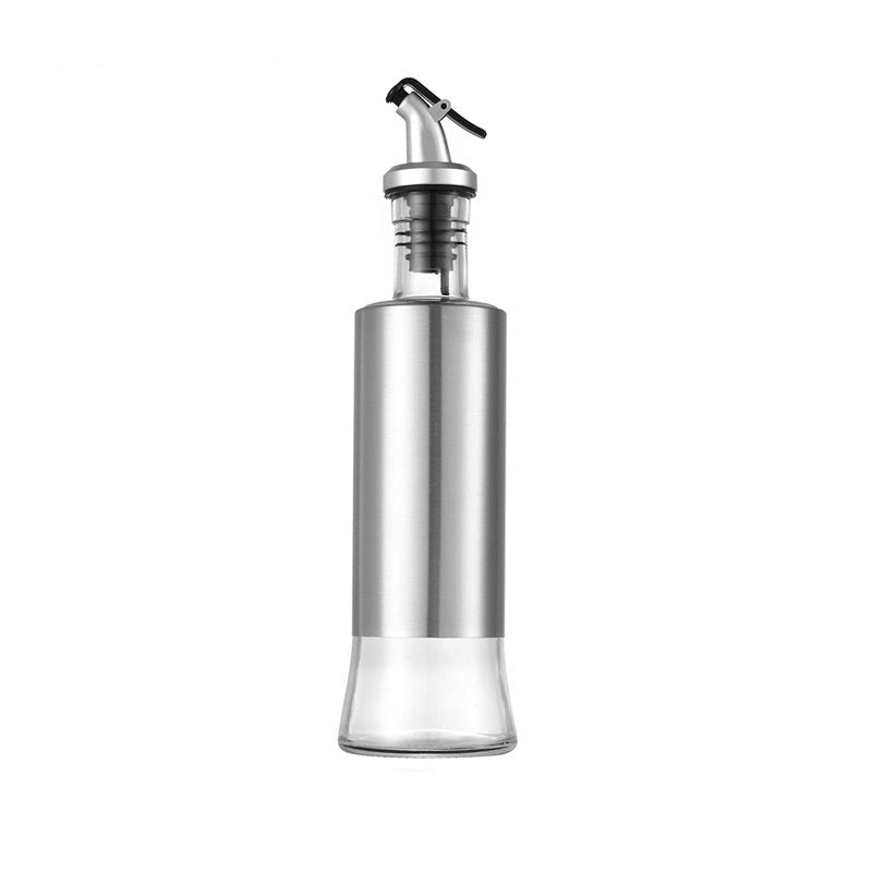 Stainless steel oil bottle with measurements on a white background