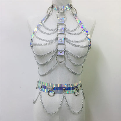 Silver chainmaille top on a mannequin against a plain background