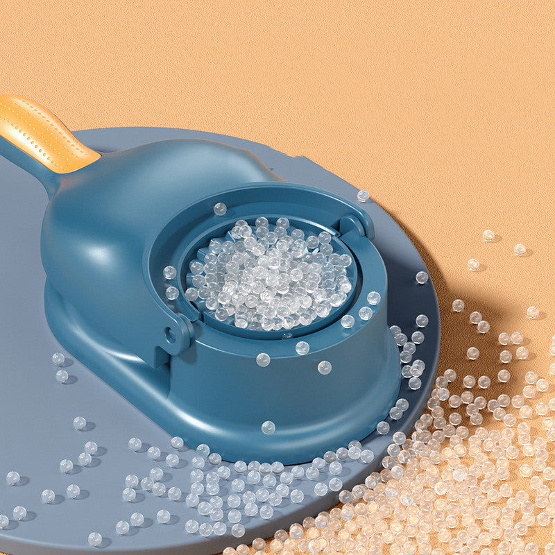 Blue scoop with clear beads on a beige background