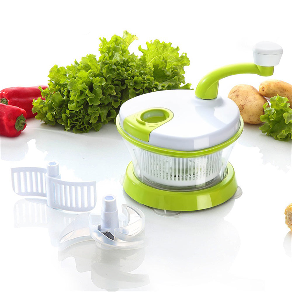 Green and white vegetable chopper with fresh vegetables on a white background