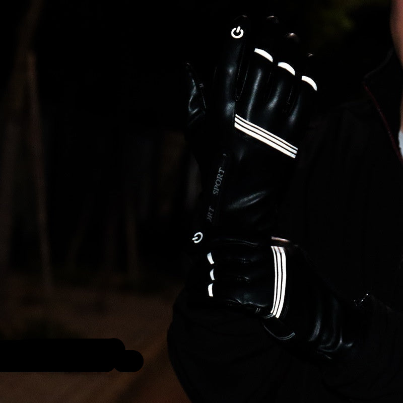 Black gloves with reflective stripes on a dark background