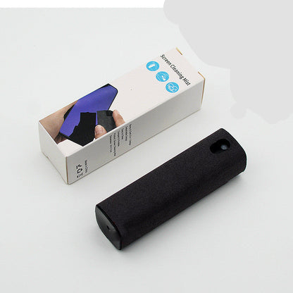 An advertisement showing a 2-in-1 screen cleaner with a spray bottle and a built-in microfiber wipe, being used to clean a smartphone screen.