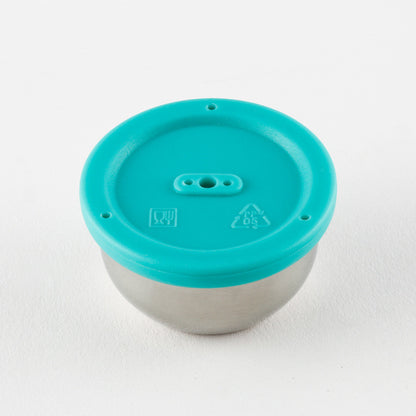 Turquoise lid on a metallic container with recycling symbols on a white background