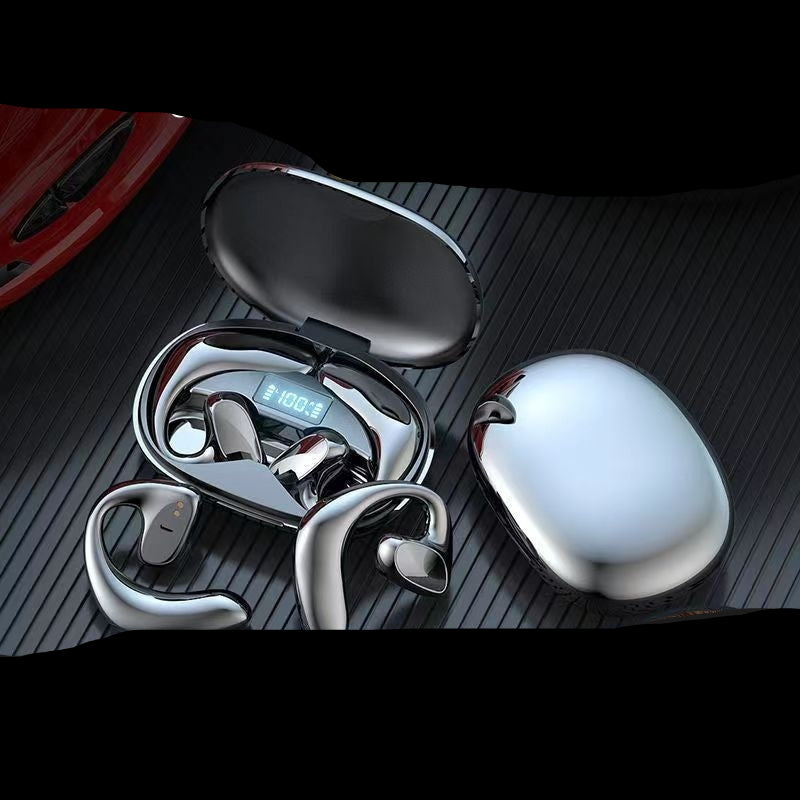 Wireless earbuds with charging case on a dark textured surface, highlighting features like 9D stereo sound effect and painlessness.