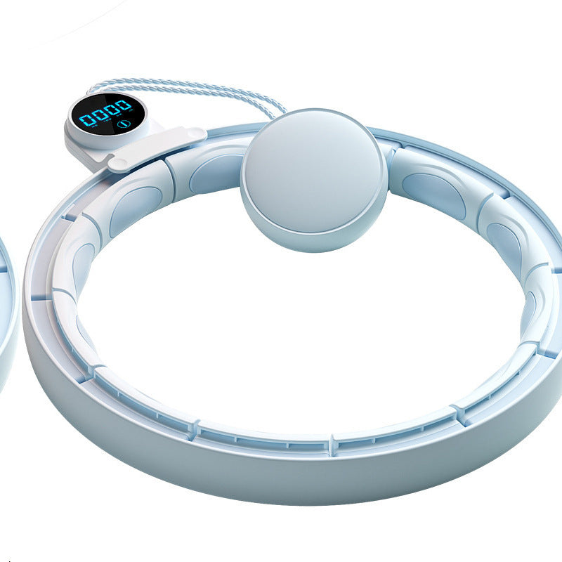 White electronic device with circular design and digital display on a white background
