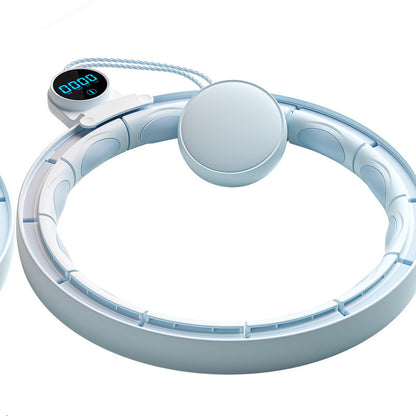 White electronic device with circular design and digital display on a white background