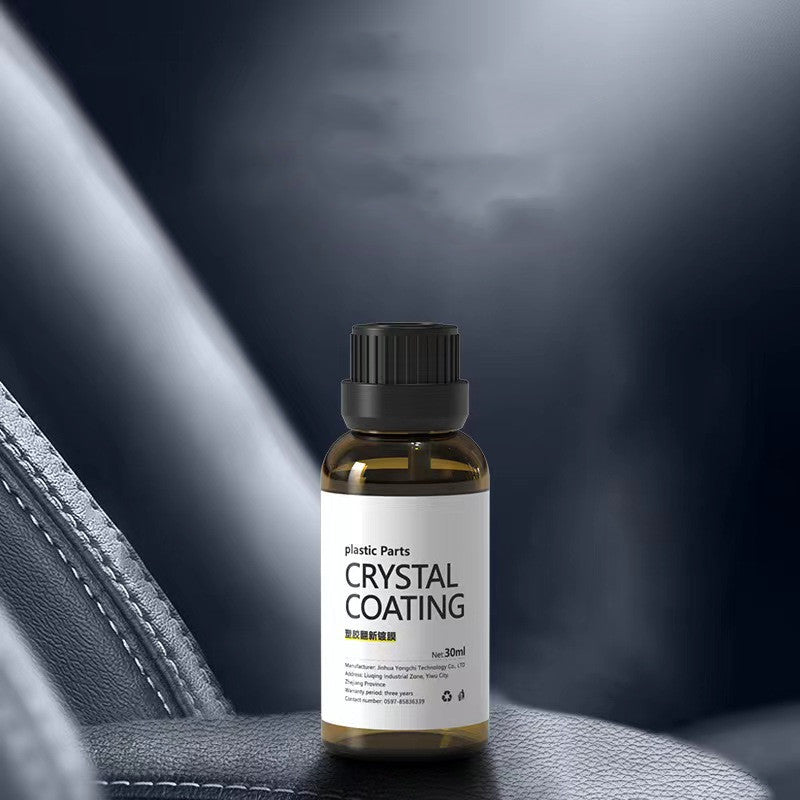 Bottle of crystal coating on a car interior background