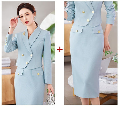 A woman in a white leisure formal suit with a blazer and a skirt, featuring long sleeves and gold buttons, standing outdoors.