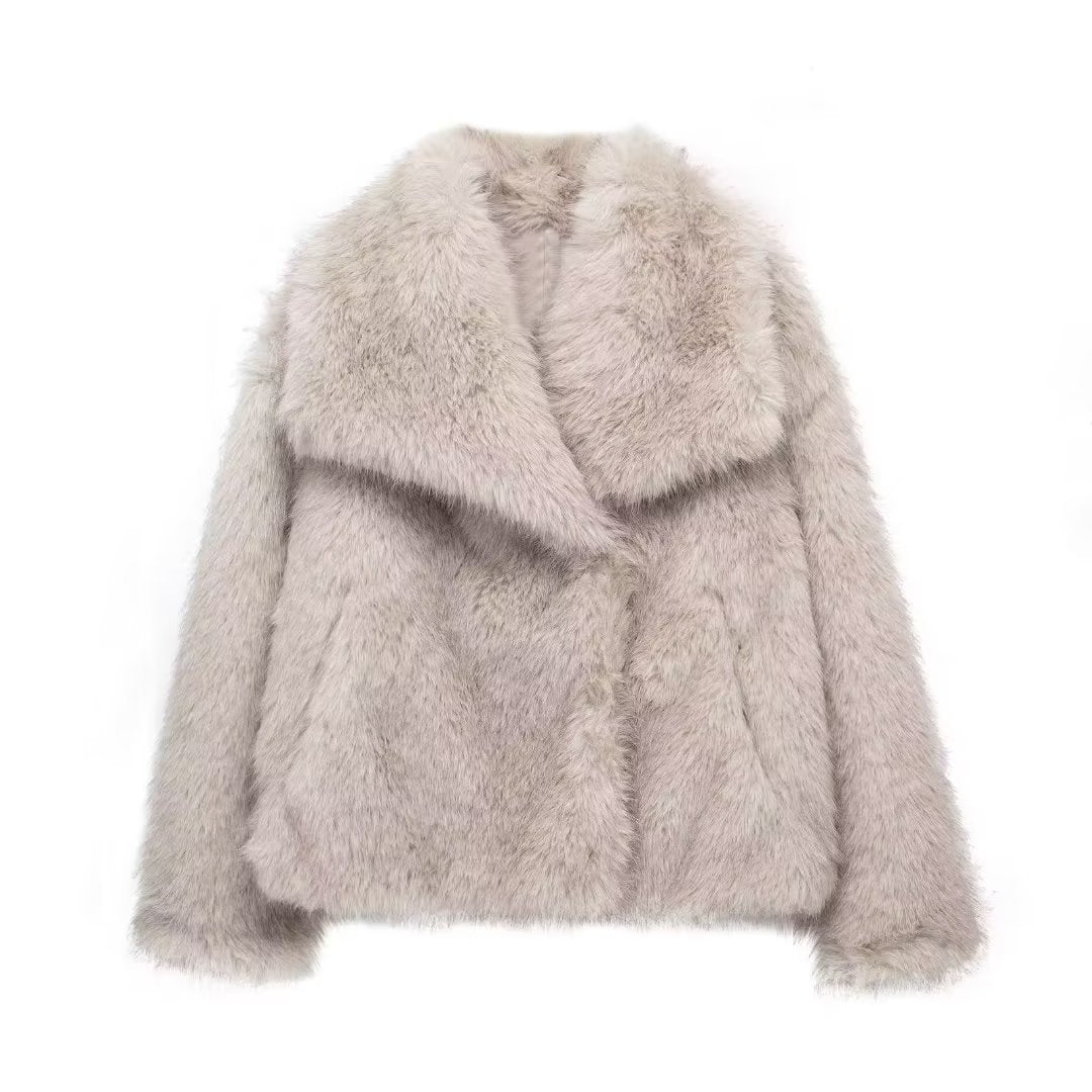 Light gray fluffy jacket on a white background