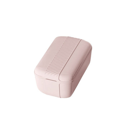 Pink rectangular case with textured surface on a white background