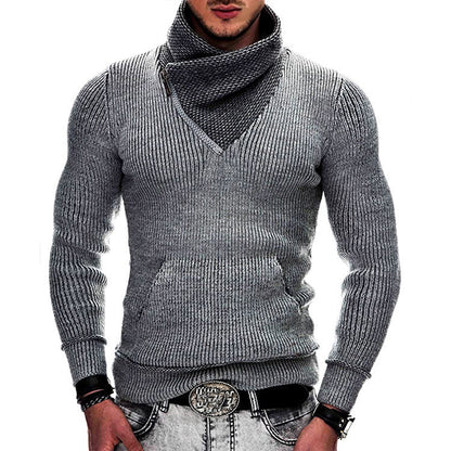Gray knitted sweater worn by a person on a white background