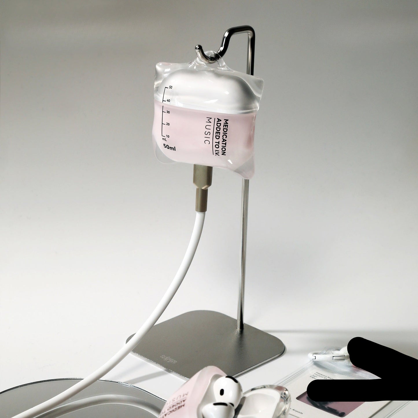 Intravenous fluid bag with pump on a white background