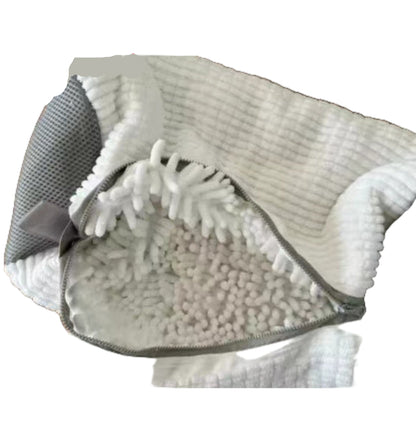 Gray and white textured blanket with a close-up of a corner showing texture details on a wooden surface.